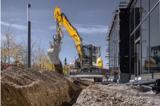 Pelle sur pneus Liebherr A 911 Compact